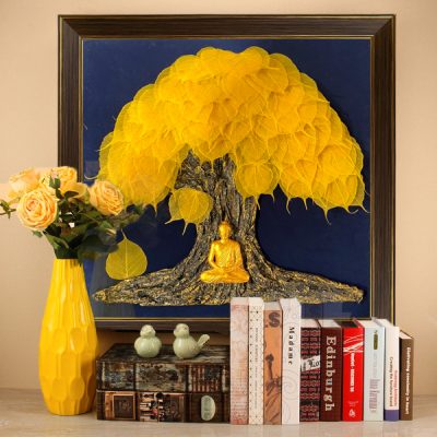 Buddha meditating under a Bodhi tree made of gold Bodhi leaves