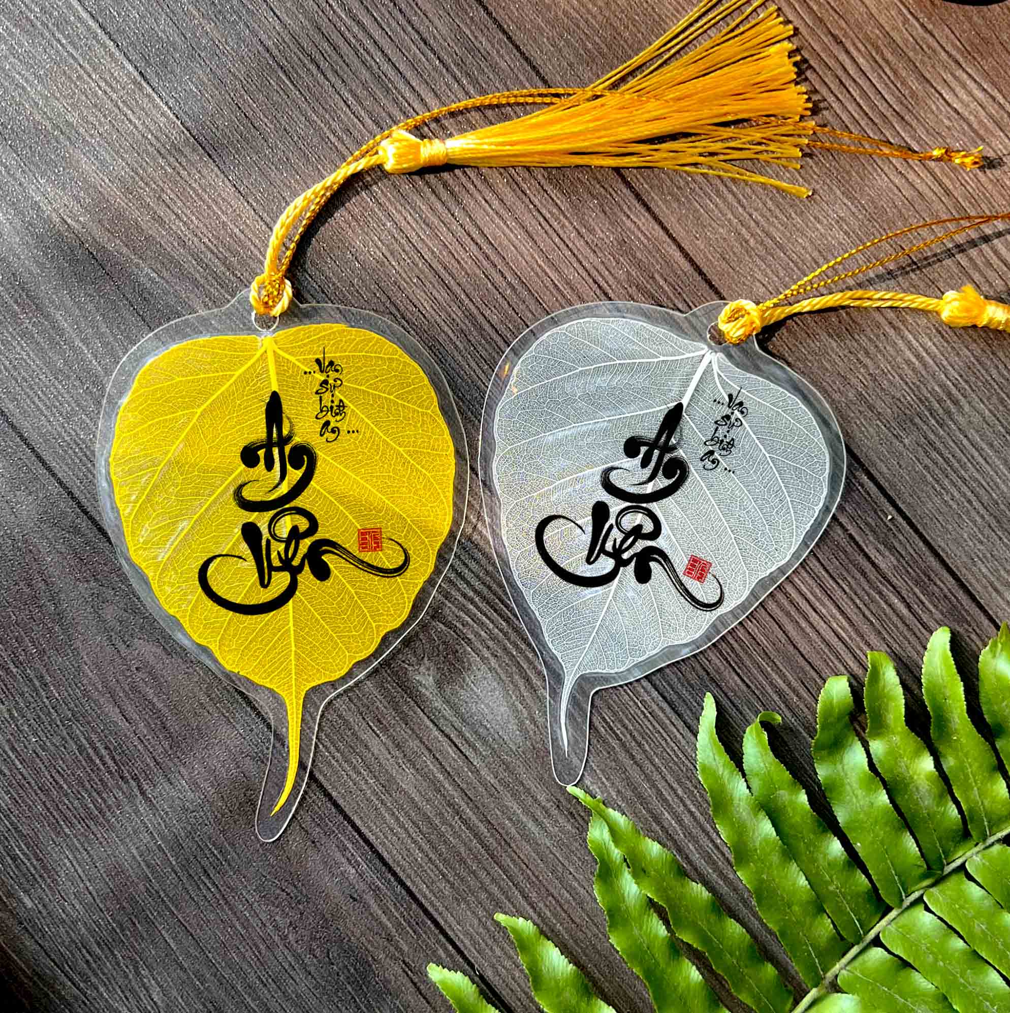 Gold and white Bodhi leaf bookmarks with tassels